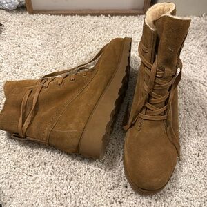Bear paw lace up boots.